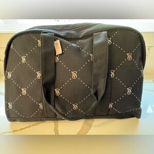 Victoria’s Secret black canvas travel bag